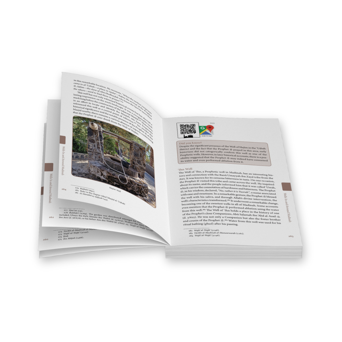 An open booklet or magazine showing two printed pages with text, a small photo, and a South African flag graphic, isolated on a black background.